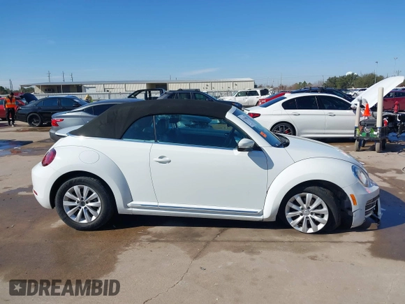 2019 Volkswagen Beetle S with VIN 3VW5DAAT0KM507437, listed as a IAAI auction lot 41380821 with 28,010 mi miles and . Bid and sale history available at DreamBid. Image 13.