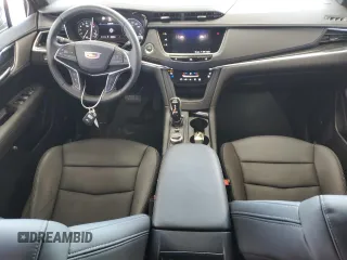 2021 Cadillac XT5 FWD Premium Luxury с VIN 1GYKNCRSXMZ155473, выставлен на аукционе Copart как лот 59883874 с пробегом 2 038 миль миль и Списание • Salvage title. История ставок и продаж доступна на DreamBid. Изображение 8.