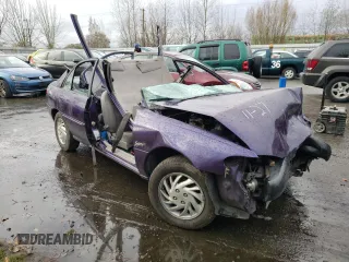 1997 Ford Escort LX with VIN 1FALP13P2VW190143, listed as a Copart auction lot 65752621 with 69,132 mi miles and Salvage title. Bid and sale history available at DreamBid. Image 1.