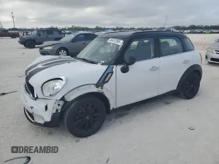 2014 MINI Countryman S with VIN WMWZC3C55EWP27353, listed as a Copart auction lot 45412265 with 92,401 mi miles and Salvage Title. Bid and sale history available at DreamBid. Image 1.
