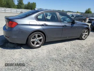 2014 BMW 3 Series 320i with VIN WBA3B1C54EK132952, listed as a Copart auction lot 63653435 with 63,260 mi miles and Salvage title. Bid and sale history available at DreamBid. Image 3.