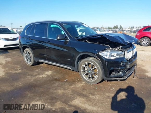 2018 BMW X5 xDrive35i with VIN 5UXKR0C59J0X87391, listed as a IAAI auction lot 41359822 with 73,913 mi miles. Bid and sale history available at carsss.com. Image 1.