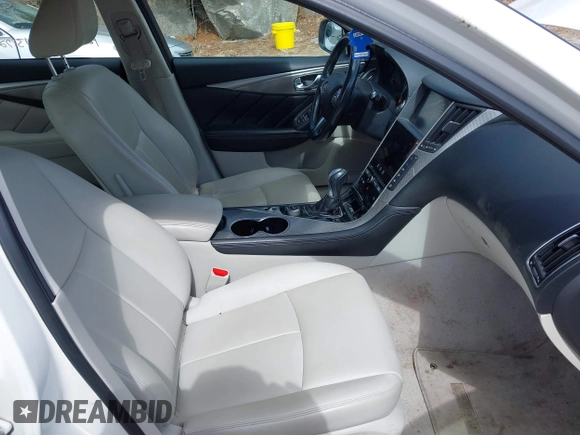 2015 Infiniti Q50 Premium z VIN JN1BV7ARXFM399617, wystawiony jako IAAI lot #41884672 z przebiegiem 116 320 mil mil oraz . Historia ofert i sprzedaży dostępna na DreamBid. Obrazek 5.