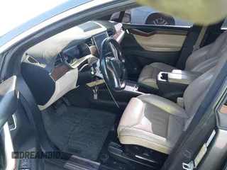 2016 Tesla Model X 70D z VIN 5YJXCAE28GF004461, wystawiony jako IAAI lot #41004214 z przebiegiem 158 962 mil mil oraz . Historia ofert i sprzedaży dostępna na DreamBid. Obrazek 5.