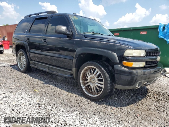 2005 Chevrolet Tahoe Z71 with VIN 1GNEC13T85R200692, listed as a Copart auction lot 62088855 with 242,402 mi miles and Salvage title. Bid and sale history available at DreamBid. Image 4.