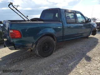 2001 Ford F-150 SuperCrew XLT with VIN 1FTRW08L41KE82711, listed as a Copart auction lot 73413384 with 0 mi miles and Salvage Title. Bid and sale history available at carsss.com. Image 3.