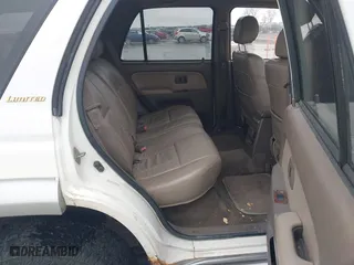 1998 Toyota 4Runner Limited with VIN JT3HN87RXW0148418, listed as a IAAI auction lot 41708975 with 305,530 mi miles. Bid and sale history available at carsss.com. Image 8.