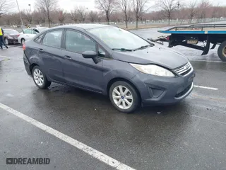 2012 Ford Fiesta SE with VIN 3FADP4BJ0CM155729, listed as a IAAI auction lot 41800447 with 90,091 mi miles. Bid and sale history available at carsss.com. Image 1.