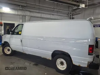 2010 Ford Econoline Cargo Commercial with VIN 1FTNE1EW4ADA91052, listed as a IAAI auction lot 42607935 with 163,519 mi miles and . Bid and sale history available at DreamBid. Image 12.