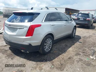 2018 Cadillac XT5 FWD with VIN 1GYKNARS2JZ232644, listed as a IAAI auction lot 42246009 with 93,855 mi miles and . Bid and sale history available at DreamBid. Image 4.