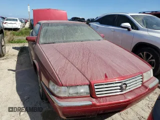 2000 Cadillac Eldorado z VIN 1G6EL12Y7YU198685, wystawiony jako Copart lot #75093094 z przebiegiem Nie podano mil oraz Szkody całkowita. Historia ofert i sprzedaży dostępna na DreamBid. Obrazek 5.