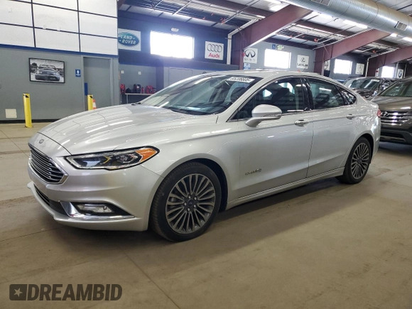 2017 Ford Fusion Hybrid Titanium z VIN 3FA6P0RU1HR300370, wystawiony jako Copart lot #65206605 z przebiegiem 150 424 mil mil oraz Czysty tytuł • Clean title. Historia ofert i sprzedaży dostępna na DreamBid. Obrazek 1.