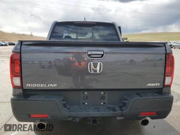 2023 Honda Ridgeline RTL-E with VIN 5FPYK3F78PB010961, listed as a Copart auction lot 51458635 with 33,508 mi miles and Salvage title. Bid and sale history available at DreamBid. Image 6.