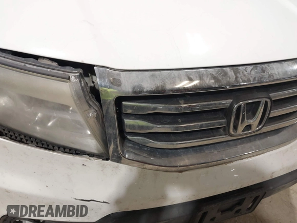 2014 Honda Pilot LX with VIN 5FNYF4H27EB025811, listed as a IAAI auction lot 41501702 with 144,909 mi miles and . Bid and sale history available at DreamBid. Image 6.