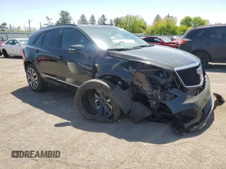 2023 Cadillac XT5 AWD Sport with VIN 1GYKNGRS8PZ100581, listed as a Copart auction lot 55157035 with 14,637 mi miles and Salvage title. Bid and sale history available at DreamBid. Image 4.