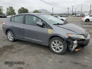 2010 Honda Insight EX with VIN JHMZE2H79AS017647, listed as a Copart auction lot 53311325 with 94,999 mi miles and Salvage Title. Bid and sale history available at DreamBid. Image 4.