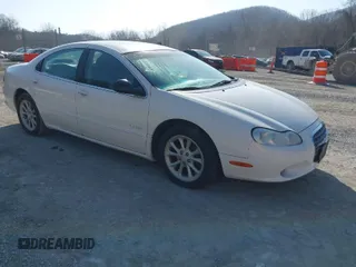 2001 Chrysler LHS z VIN 2C3HC56G61H535038, wystawiony jako IAAI lot #41717580 z przebiegiem 123 103 mil mil oraz . Historia ofert i sprzedaży dostępna na DreamBid. Obrazek 1.