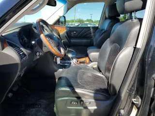 2015 Infiniti QX80 with VIN JN8AZ2NE9F9084032, listed as a Copart auction lot 56218324 with 146,152 mi miles and Salvage Title. Bid and sale history available at carsss.com. Image 7.