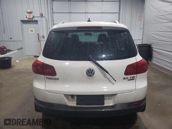 2013 Volkswagen Tiguan SEL with VIN WVGBV3AX2DW058147, listed as a Copart auction lot 47110285 with 156,145 mi miles and Salvage Title. Bid and sale history available at DreamBid. Image 6.