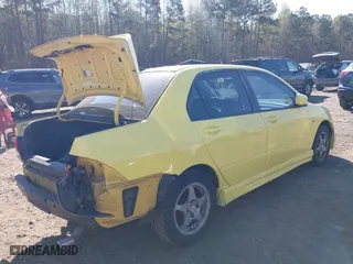2002 Mitsubishi Lancer OZ-Rally with VIN JA3AJ86E32U081427, listed as a IAAI auction lot 41875587 with 190,214 mi miles. Bid and sale history available at carsss.com. Image 4.