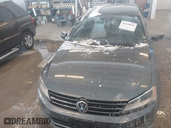 2016 Volkswagen Jetta Sport z VIN 3VWD17AJ9GM250243, wystawiony jako IAAI lot #41618054 z przebiegiem 38 520 mil mil oraz . Historia ofert i sprzedaży dostępna na DreamBid. Obrazek 12.