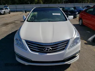 2017 Hyundai Azera Limited z VIN KMHFH4JG0HA581877, wystawiony jako Copart lot #81221514 z przebiegiem 166 057 mil mil oraz Szkoda całkowita • Salvage title. Historia ofert i sprzedaży dostępna na DreamBid. Obrazek 5.