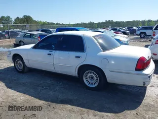 2000 Mercury Grand Marquis LS z VIN 2MEFM75W3YX689323, wystawiony jako IAAI lot #42019687 z przebiegiem 241 045 mil mil oraz . Historia ofert i sprzedaży dostępna na DreamBid. Obrazek 14.