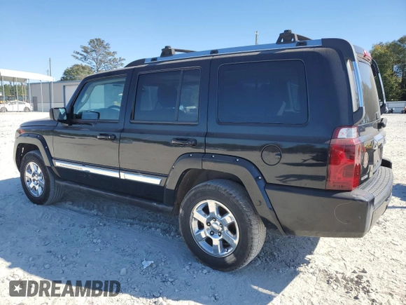 2006 Jeep Commander Limited with VIN 1J8HH58N56C291880, listed as a Copart auction lot 71543874 with 217,366 mi miles and Salvage title. Bid and sale history available at DreamBid. Image 2.