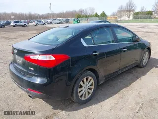 2014 Kia Forte EX with VIN KNAFX4A83E5140813, listed as a IAAI auction lot 42000241 with 201,912 mi miles. Bid and sale history available at carsss.com. Image 4.
