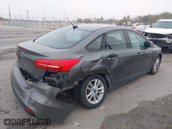 2017 Ford Focus SE with VIN 1FADP3F22HL299398, listed as a IAAI auction lot 41162384 with 121,993 mi miles and . Bid and sale history available at DreamBid. Image 6.