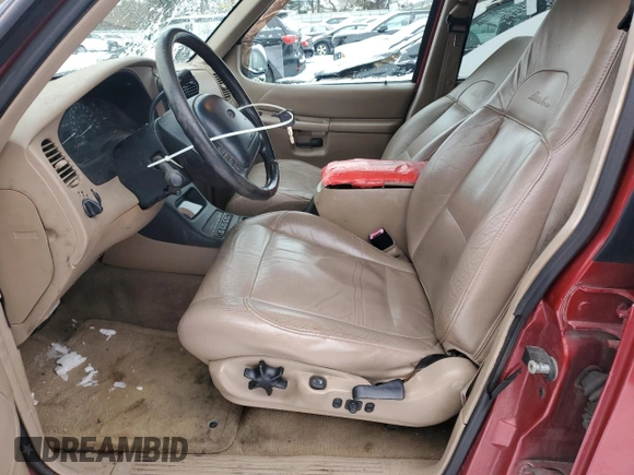 1999 Ford Explorer XLT with VIN 1FMDU34E7XZA60386, listed as a Copart auction lot 86851594 with 218,592 mi miles and Salvage title. Bid and sale history available at DreamBid. Image 7.