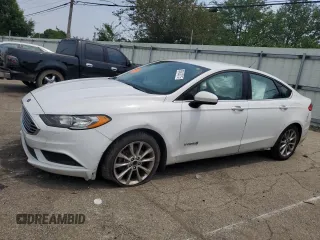 2017 Ford Fusion Hybrid SE with VIN 3FA6P0LU2HR380867, listed as a Copart auction lot 60428215 with 330,201 mi miles and Salvage title. Bid and sale history available at DreamBid. Image 1.