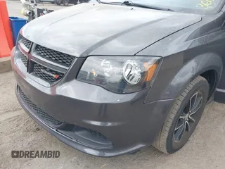 2015 Dodge Grand Caravan American Value with VIN 2C4RDGBG2FR542844, listed as a IAAI auction lot 42109983 with 129,718 mi miles and . Bid and sale history available at DreamBid. Image 6.