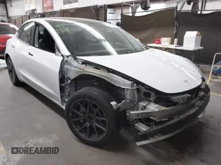 2018 Tesla Model 3 Long Range Battery z VIN 5YJ3E1EA9JF044426, wystawiony jako IAAI lot #42360007 z przebiegiem 162 023 mil mil oraz . Historia ofert i sprzedaży dostępna na DreamBid. Obrazek 1.