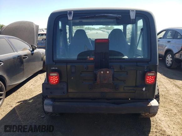 1998 Jeep Wrangler Sport with VIN 1J4FY19S2WP790179, listed as a Copart auction lot 69853294 with 148,675 mi miles and Salvage Title. Bid and sale history available at carsss.com. Image 6.