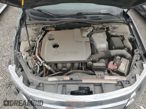 2011 Ford Fusion Hybrid с VIN 3FADP0L39BR214920, выставлен на аукционе Copart как лот 57888465 с пробегом 133 656 миль миль и Списание • Salvage title. История ставок и продаж доступна на DreamBid. Изображение 11.