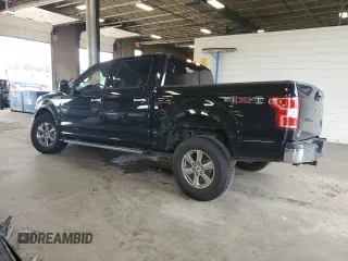 2019 Ford F-150 XL with VIN 1FTEW1EPXKKE15382, listed as a Copart auction lot 61349905 with 92,704 mi miles and Salvage title. Bid and sale history available at DreamBid. Image 2.
