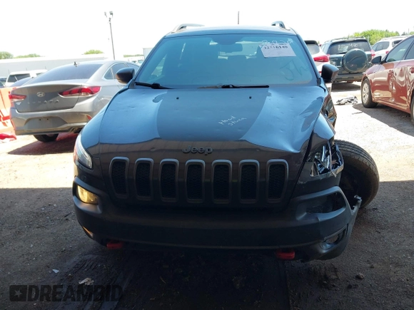 2016 Jeep Cherokee Trailhawk z VIN 1C4PJMBSXGW123829, wystawiony jako IAAI lot #42316140 z przebiegiem 77 730 mil mil oraz . Historia ofert i sprzedaży dostępna na DreamBid. Obrazek 12.