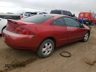 1999 Mercury Cougar z VIN 1ZWFT61L0X5760822, wystawiony jako Copart lot #66851824 z przebiegiem 128 109 mil mil oraz Tytuł czysty. Historia ofert i sprzedaży dostępna na DreamBid. Obrazek 3.