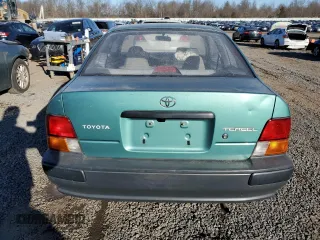 1996 Toyota Tercel DX z VIN JT2AC52L6T0170537, wystawiony jako Copart lot #42576525 z przebiegiem 66 926 mil mil oraz Szkoda całkowita • Salvage title. Historia ofert i sprzedaży dostępna na DreamBid. Obrazek 6.