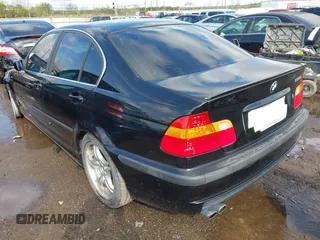 2003 BMW 3 Series 330i with VIN WBAEV53453KM03111, listed as a IAAI auction lot 42007086 with 156,353 mi miles. Bid and sale history available at carsss.com. Image 3.