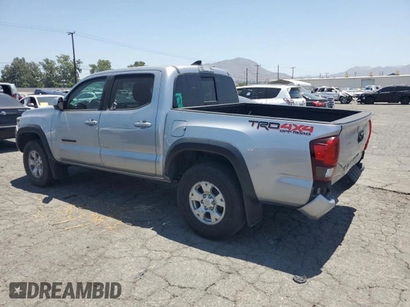 2019 Toyota Tacoma SR with VIN 3TMCZ5AN2KM277551, listed as a Copart auction lot 61586585 with 59,670 mi miles and Salvage title. Bid and sale history available at DreamBid. Image 2.