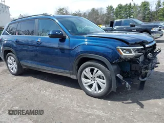 2023 Volkswagen Atlas SE z VIN 1V2HR2CA2PC505456, wystawiony jako IAAI lot #42032269 z przebiegiem 7 918 mil mil oraz . Historia ofert i sprzedaży dostępna na DreamBid. Obrazek 1.