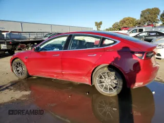 2018 Tesla Model 3 Long Range Battery with VIN 5YJ3E1EAXJF047285, listed as a Copart auction lot 87875175 with 114,896 mi miles and Salvage Title. Bid and sale history available at DreamBid. Image 2.