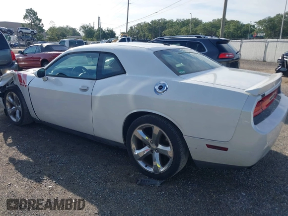 2014 Dodge Challenger R/T with VIN 2C3CDYBT6EH185590, listed as a IAAI auction lot 42536813 with 198,854 mi miles and . Bid and sale history available at DreamBid. Image 3.