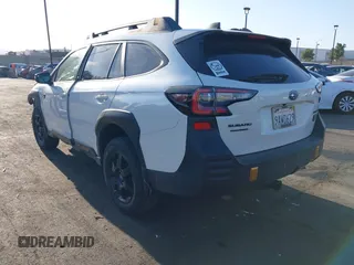 2022 Subaru Outback Wilderness z VIN 4S4BTGUD2N3210638, wystawiony jako IAAI lot #41979884 z przebiegiem 23 584 mil mil oraz . Historia ofert i sprzedaży dostępna na DreamBid. Obrazek 3.