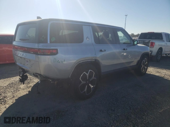 2024 Rivian R1S Adventure z VIN 7PDSGBBA5RN044560, wystawiony jako Copart lot #70594924 z przebiegiem 2449 mil mil oraz Szkody całkowita. Historia ofert i sprzedaży dostępna na DreamBid. Obrazek 3.
