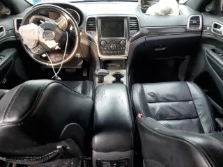 2014 Jeep Grand Cherokee Overland with VIN 1C4RJFCT0EC237333, listed as a Copart auction lot 46659195 with 0 mi miles and Salvage Title. Bid and sale history available at carsss.com. Image 8.