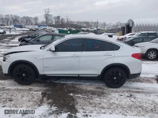 2018 BMW X4 xDrive28i with VIN 5UXXW3C5XJ0T82043, listed as a IAAI auction lot 41246495 with 106,606 mi miles. Bid and sale history available at carsss.com. Image 14.
