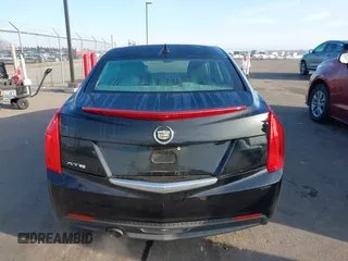 2014 Cadillac ATS Standard RWD with VIN 1G6AA5RA7E0100973, listed as a IAAI auction lot 41795657 with 93,807 mi miles and . Bid and sale history available at DreamBid. Image 16.